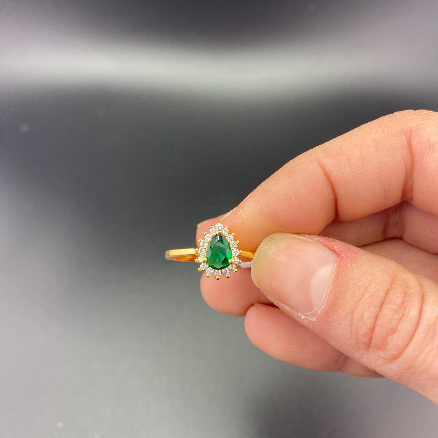 Pear Shape Emerald with Zirconia Setting Ring