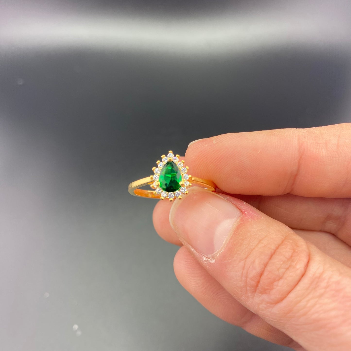 Pear Shape Emerald with Zirconia Setting Ring