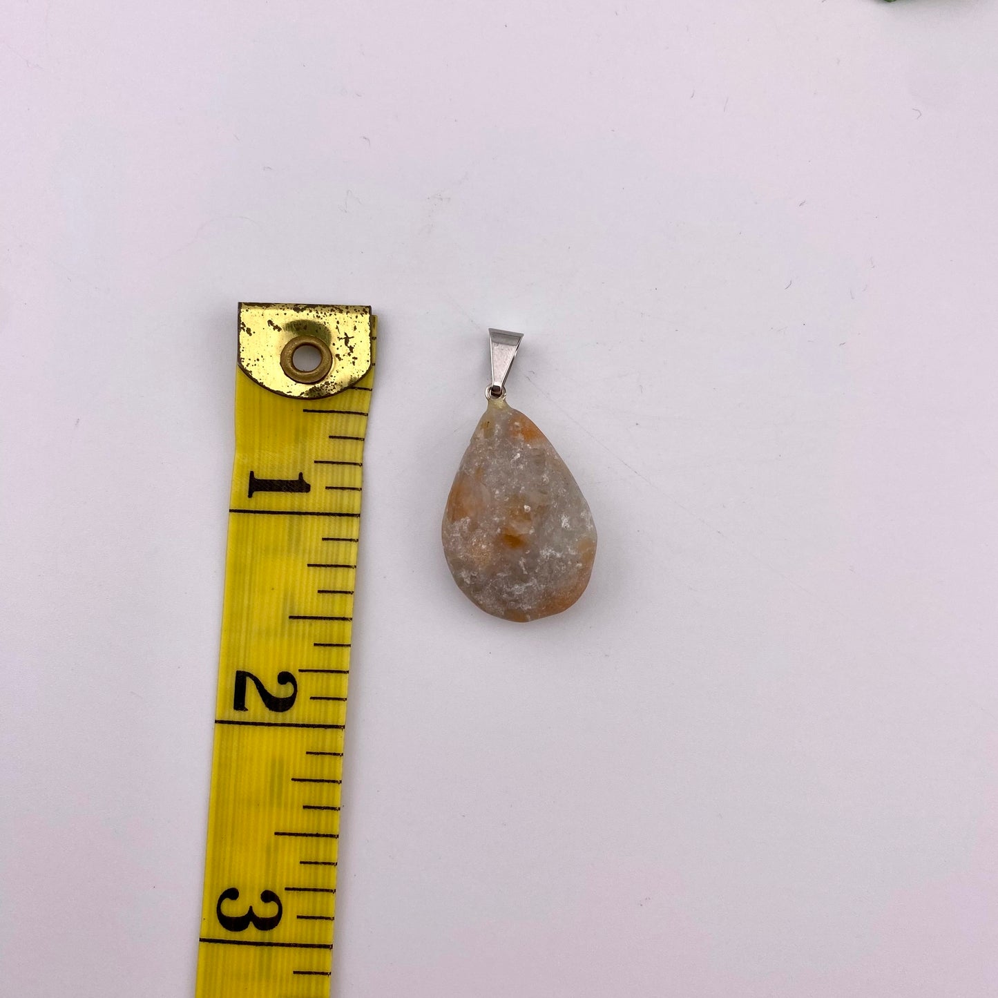 Pear Polished Orange Calcite Pendant